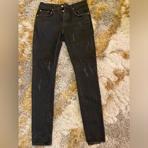 Black jeans with slight grey rips. In good condition with only 2-3 wears.